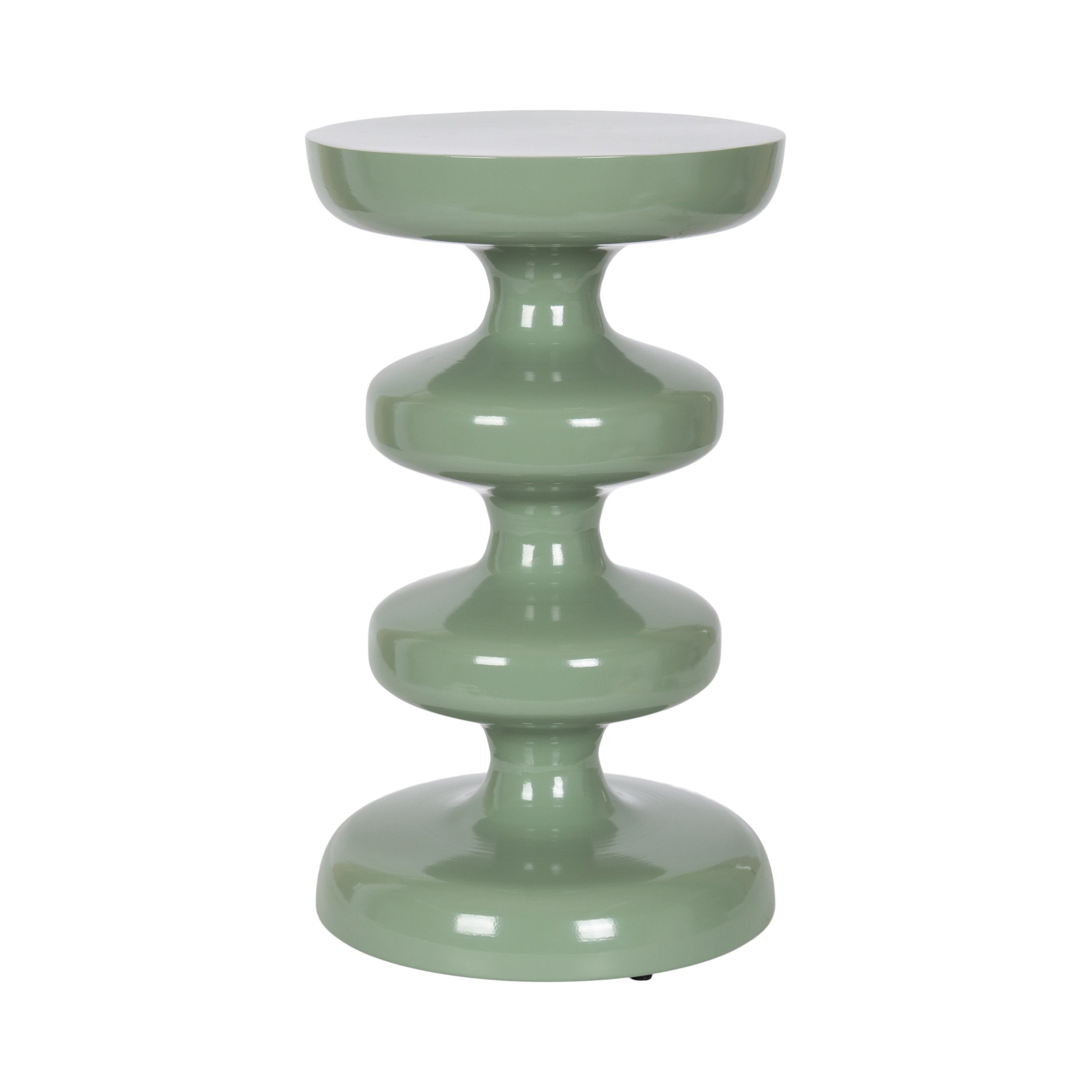Sculptural seafoam green side table bringing a calm, modern organic accent to a light-filled room.