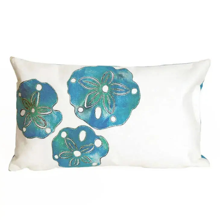 Sand dollar pattern outdoor throw pillow styled on coastal porch bench.