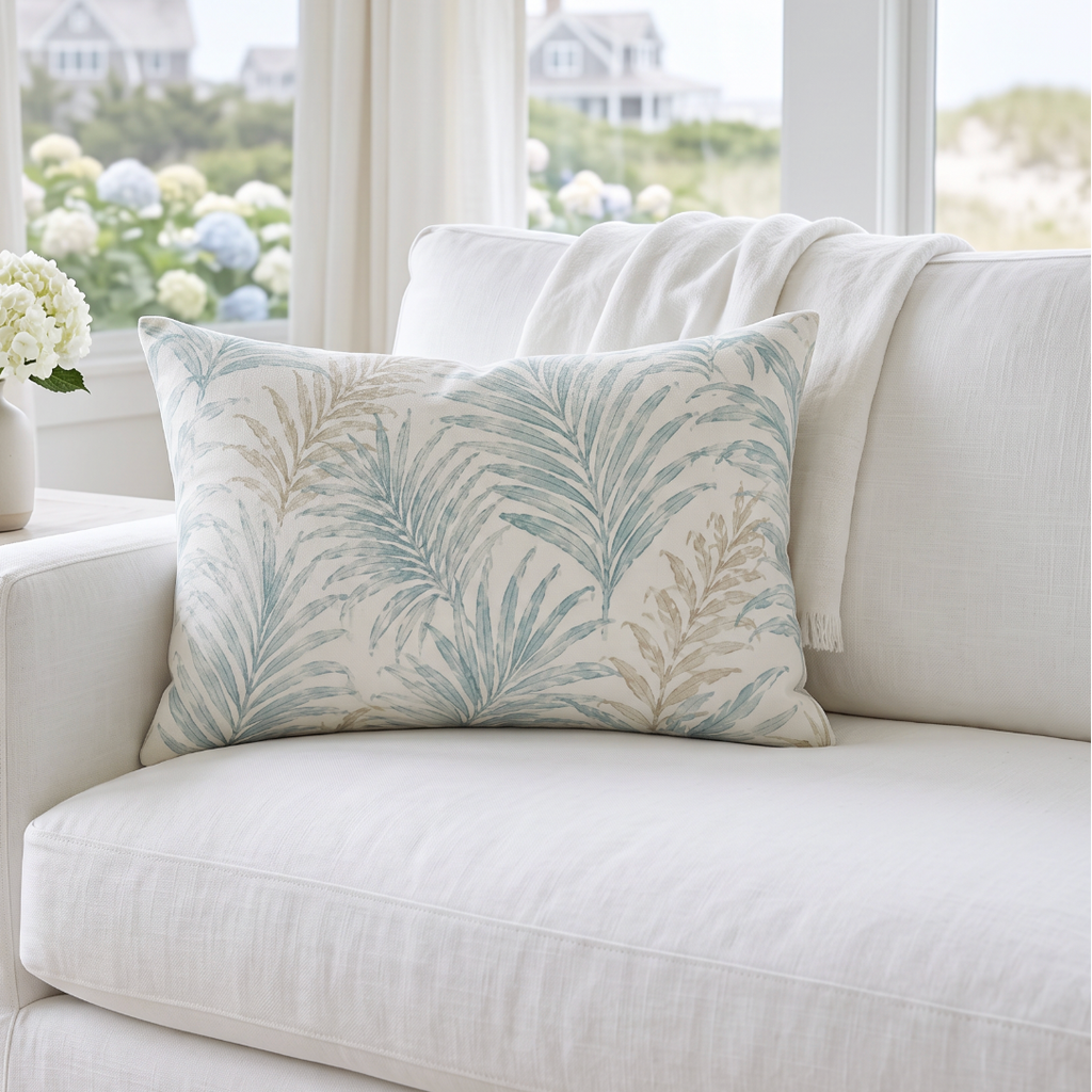 Seafoam and sand frond lumbar throw pillow with a creamy background for modern coastal living room decor.