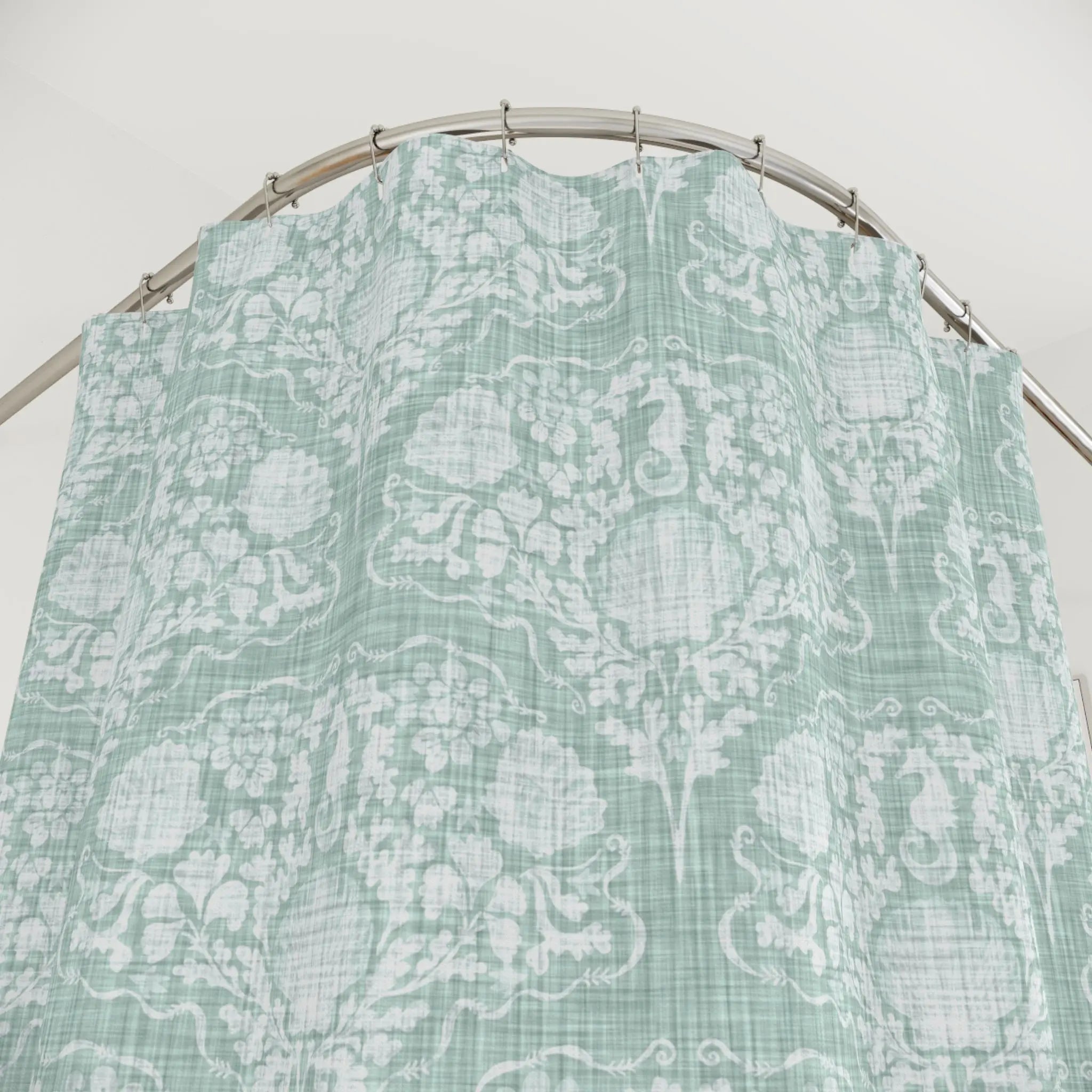 Coastal Crest Shower Curtain in seafoam green with a vintage damask pattern for a coastal-cottage vibe.
