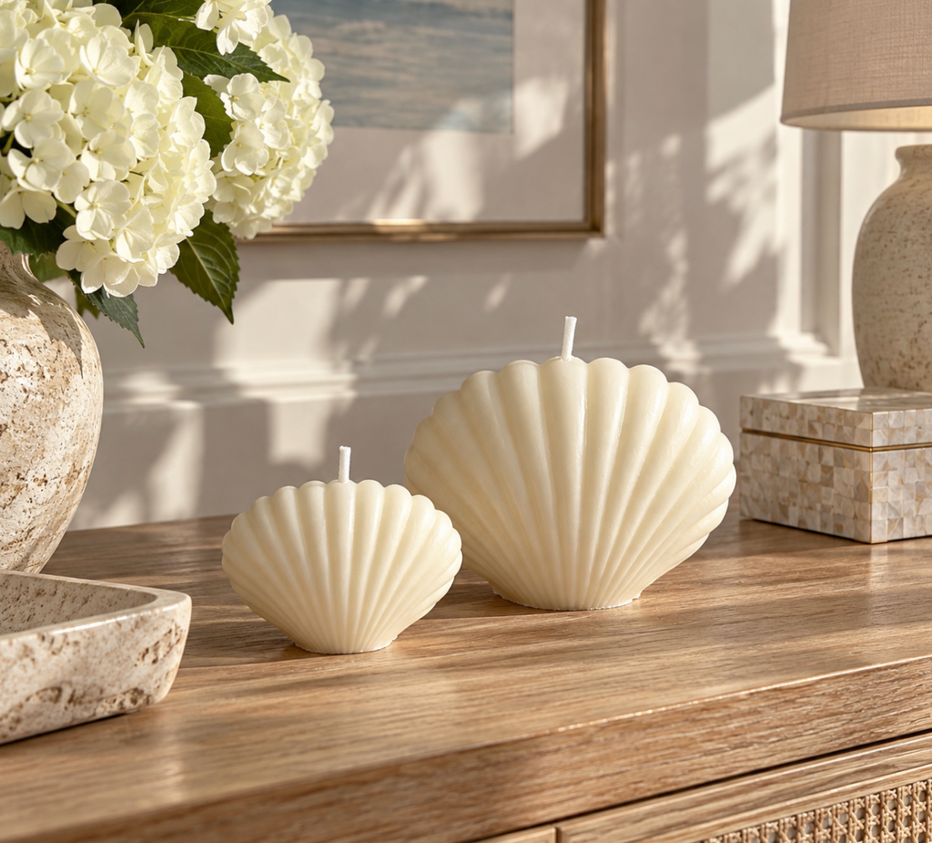 Seashell candle styled as a coastal coffee table accent
