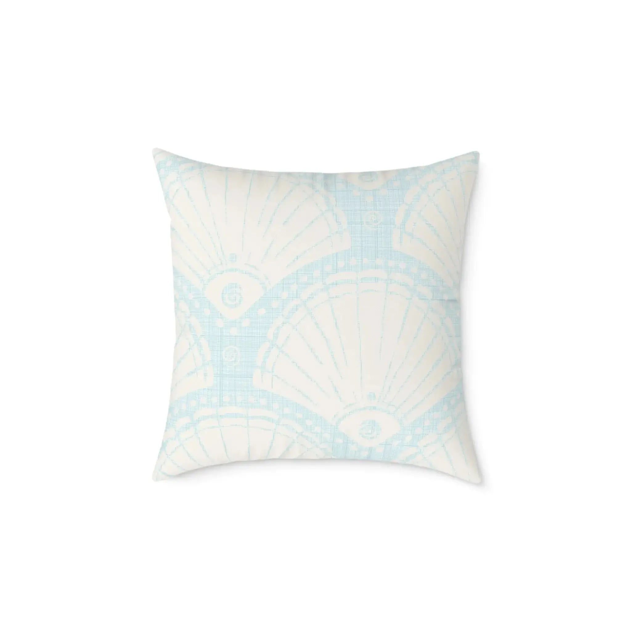 Square coastal pillow with pale blue shell motif and linen-like texture.
