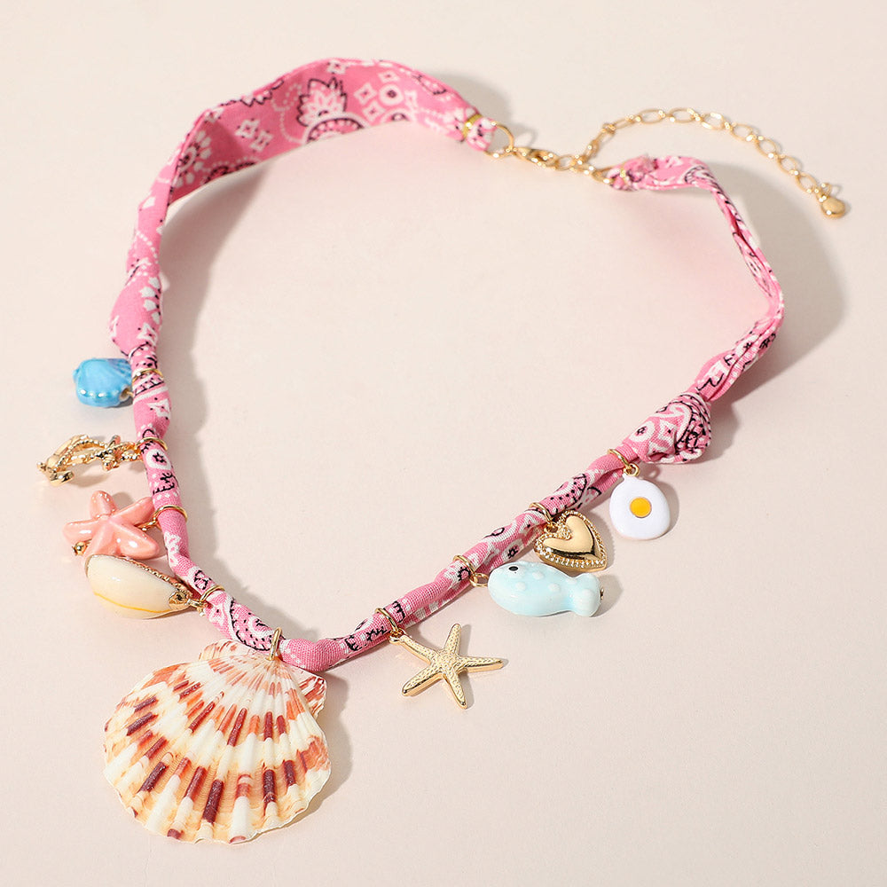 Seashell starfish anchor heart charm station fabric statement necklace with coastal nautical design