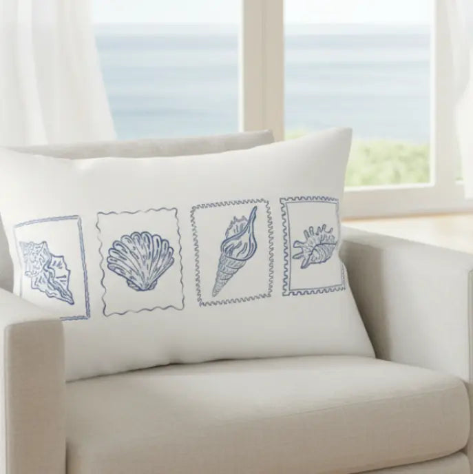 Seashell Reverie Lumbar Pillow white with blue shell-pattern prints for home decor.