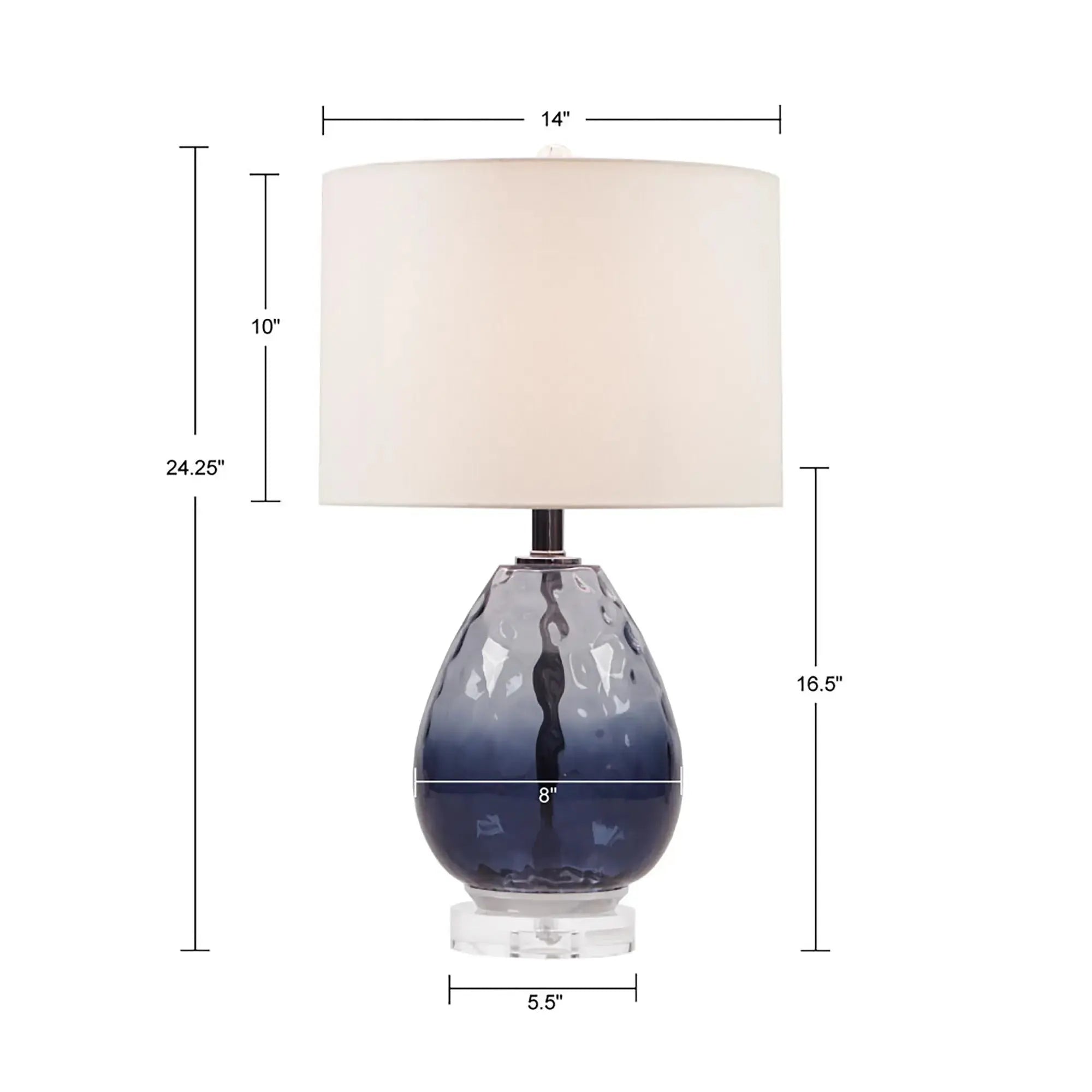 Sculptural blue ombre glass lamp bringing soft coastal elegance to a bedroom