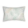 Neutral coastal frond lumbar pillow designed for targeted lower‑back support on wicker chairs and window seats.