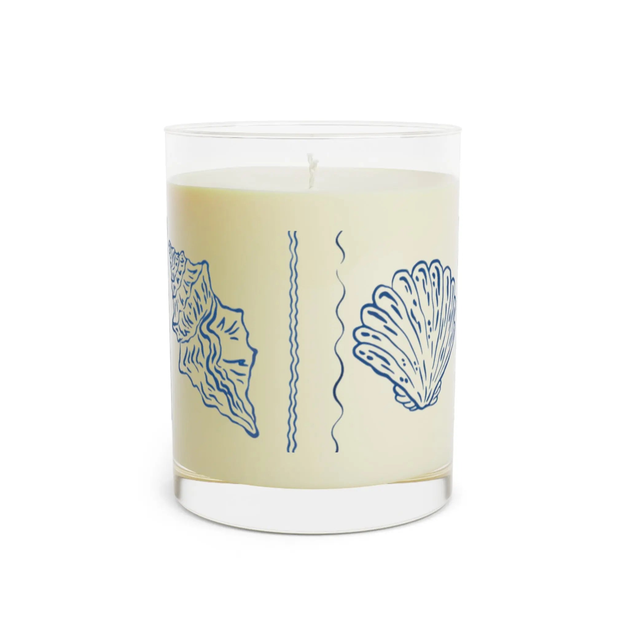 Seashell Reverie Ocean Mist Candle, blue seashell sketch on cream wax in clear glass, coastal home decor candle.