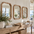 Set of three natural wood wall mirrors with softly arched clipped-corner frames for a coastal entryway