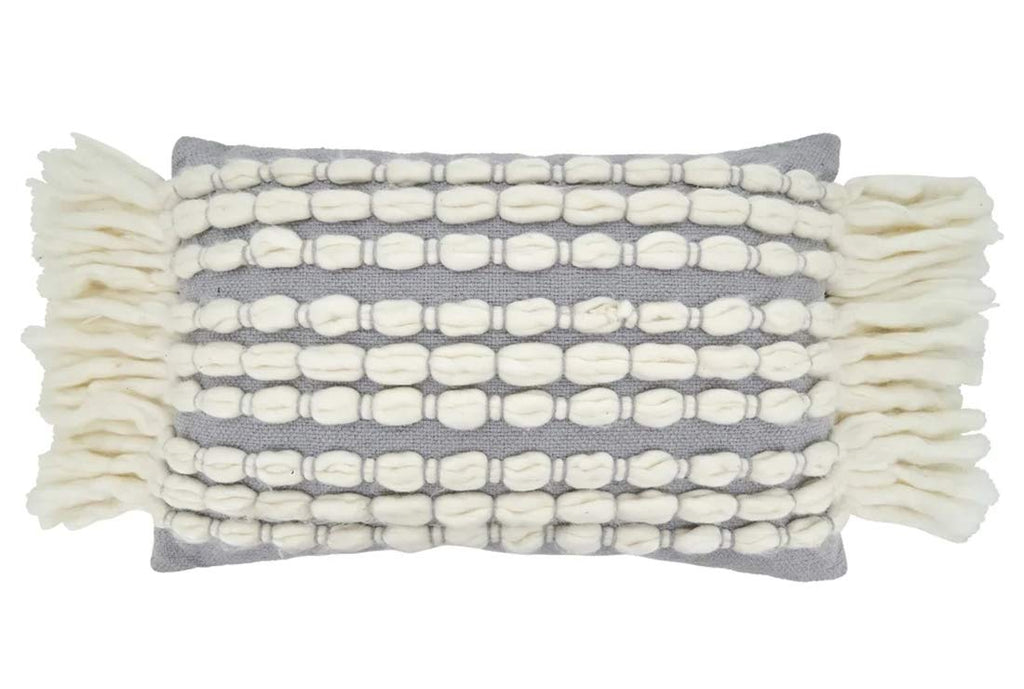 Neutral coastal throw pillow with raised cream loops on grey fabric for modern seaside decor.

