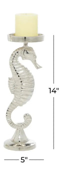 Polished silver seahorse candle holder on a round base, 14 inches tall, 5 inches wide, with a candle.