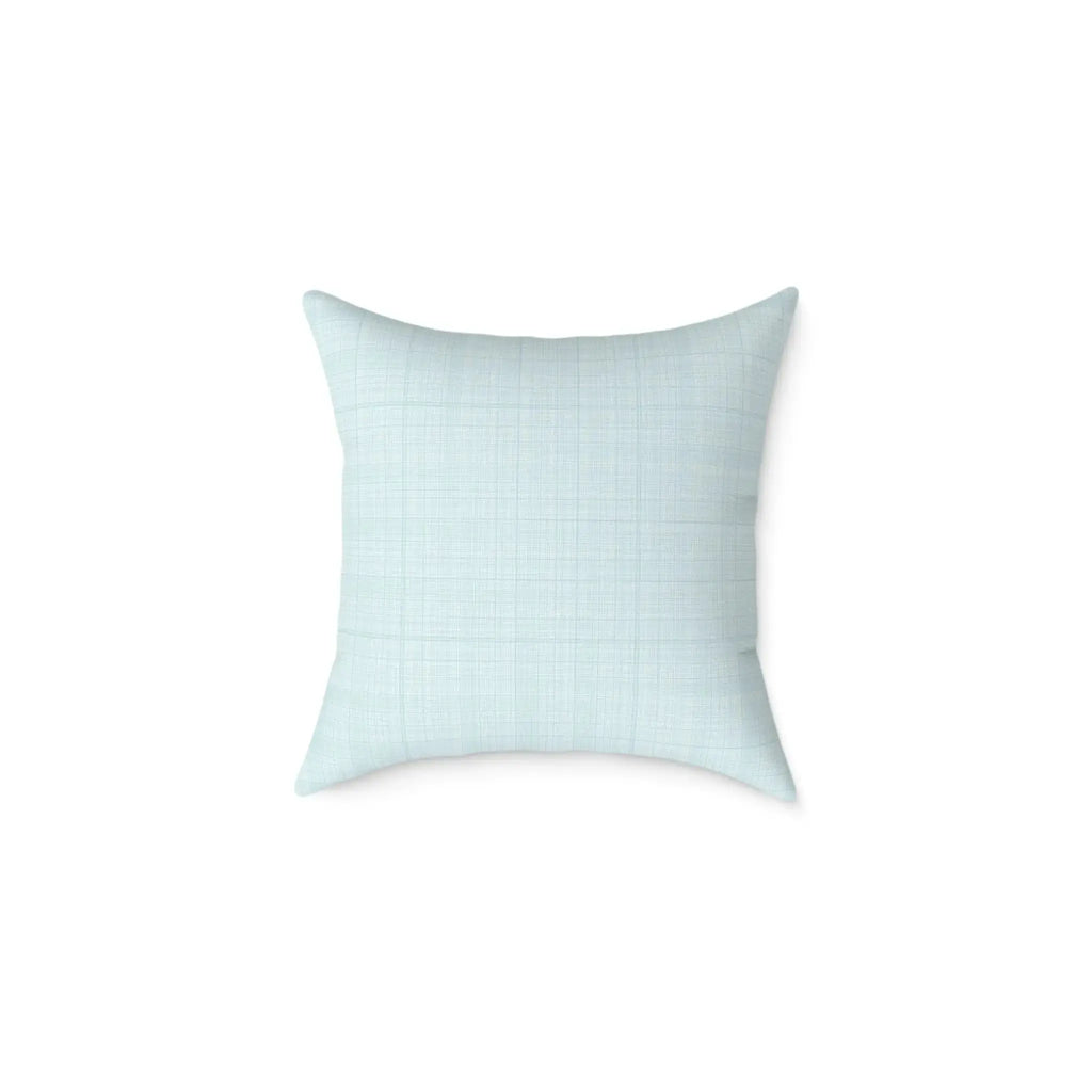 Beach house throw pillow with a refined pale blue shell motif.