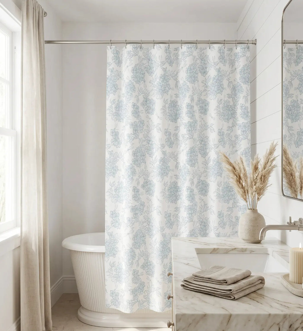 Elegant blue and white floral shower curtain for a refined coastal bath