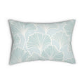 Soft seafoam botanical lumbar pillow adding gentle color and coastal texture to a beach house living room.
