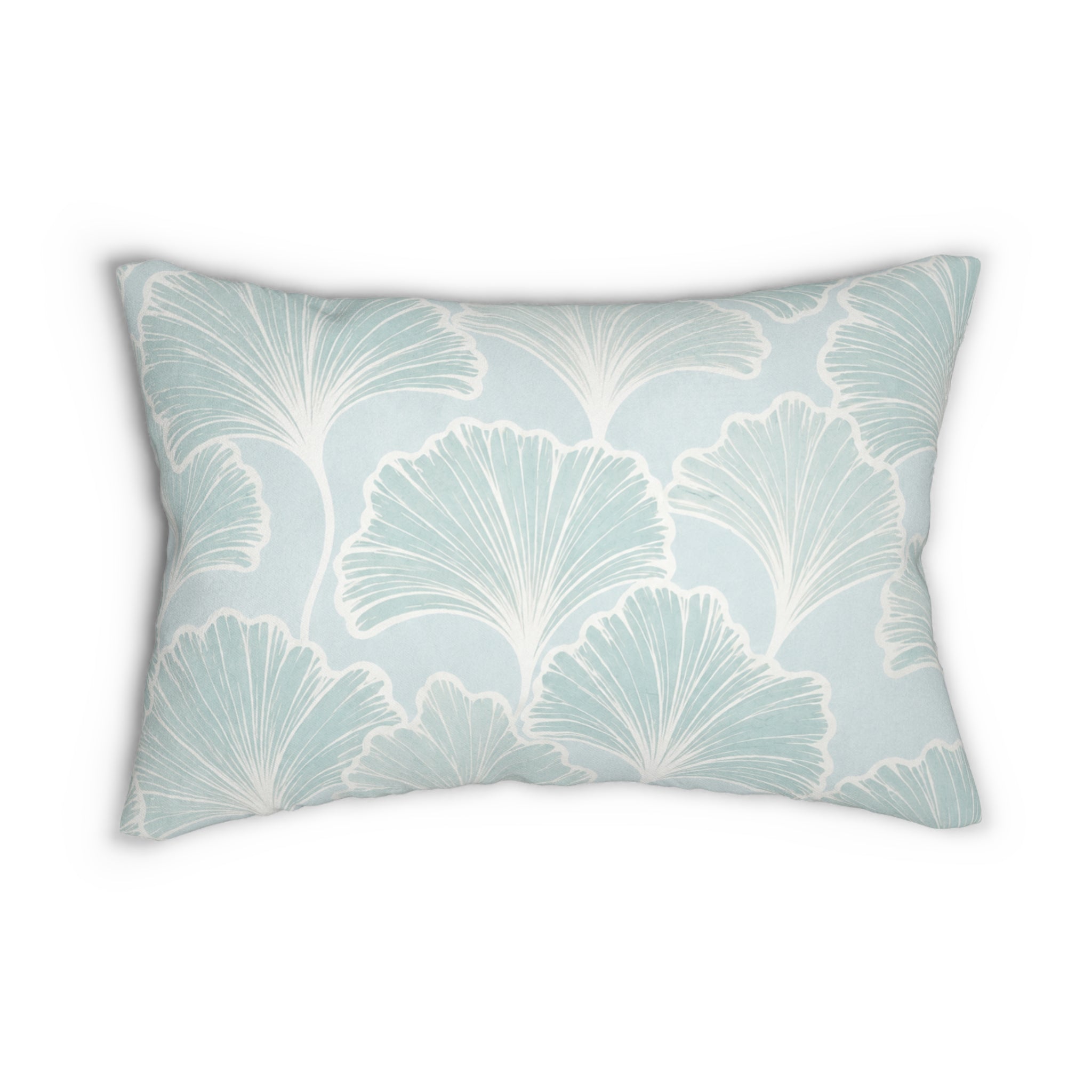 Soft seafoam botanical lumbar pillow adding gentle color and coastal texture to a beach house living room.