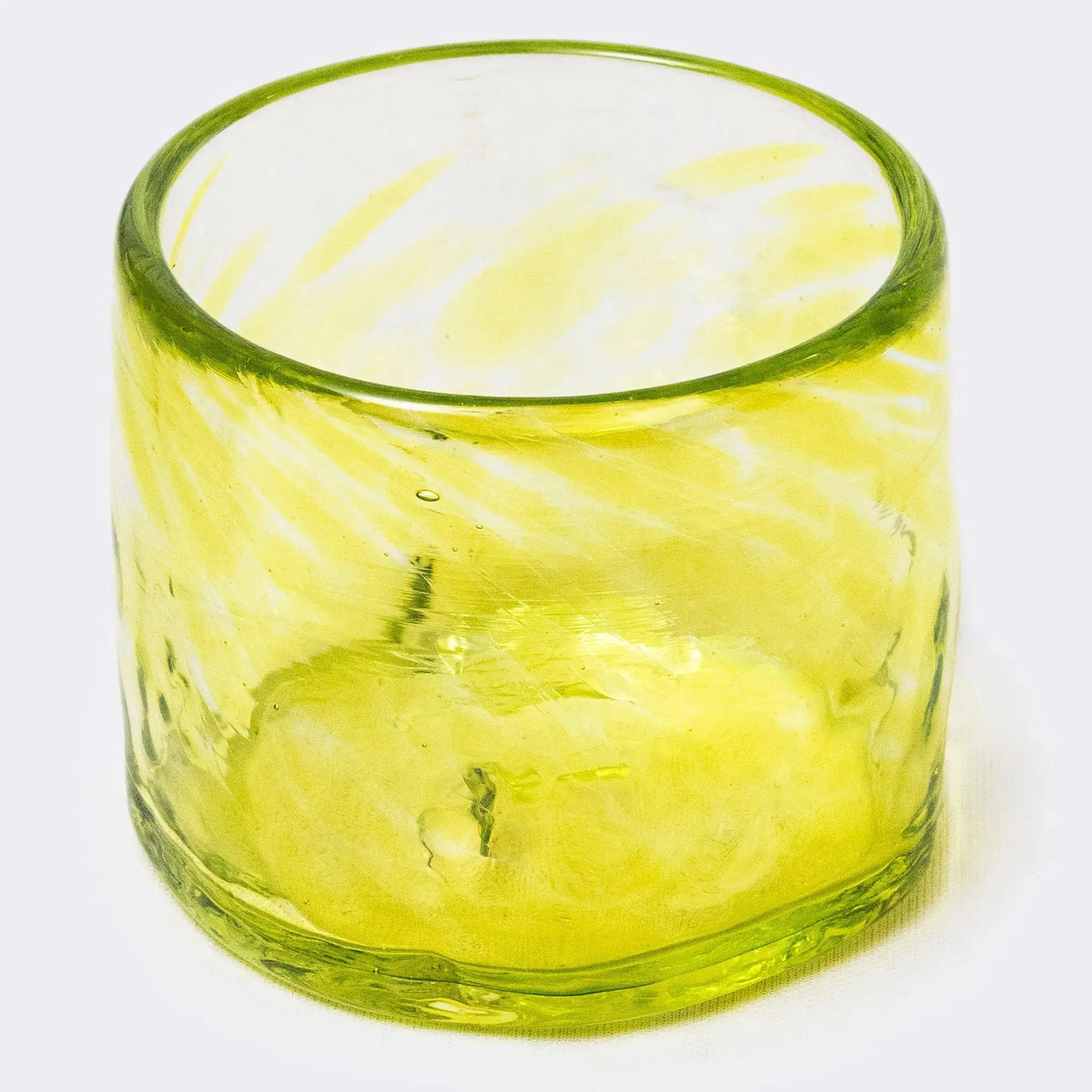 Soleado handblown drinkware with mixed colors on an outdoor table