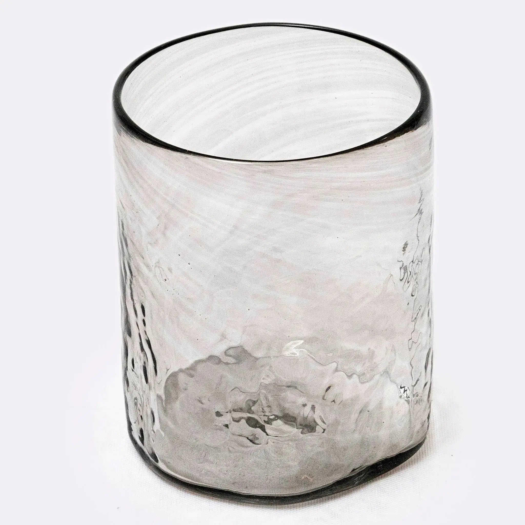 Soleado glasses and tumblers filled with drinks on a serving tray.