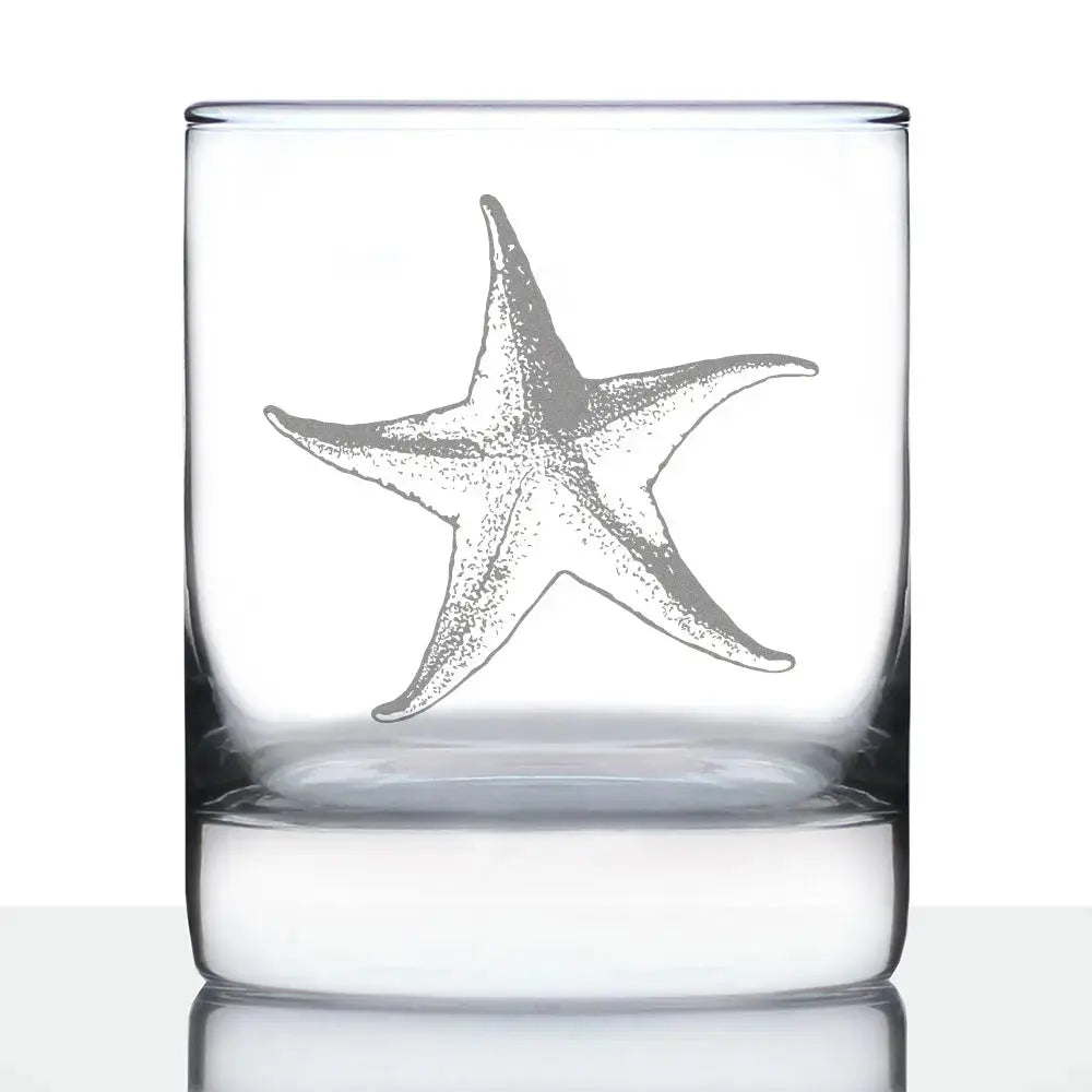 Starfish cocktail glass with nautical motif, coastal barware for beach house entertaining.