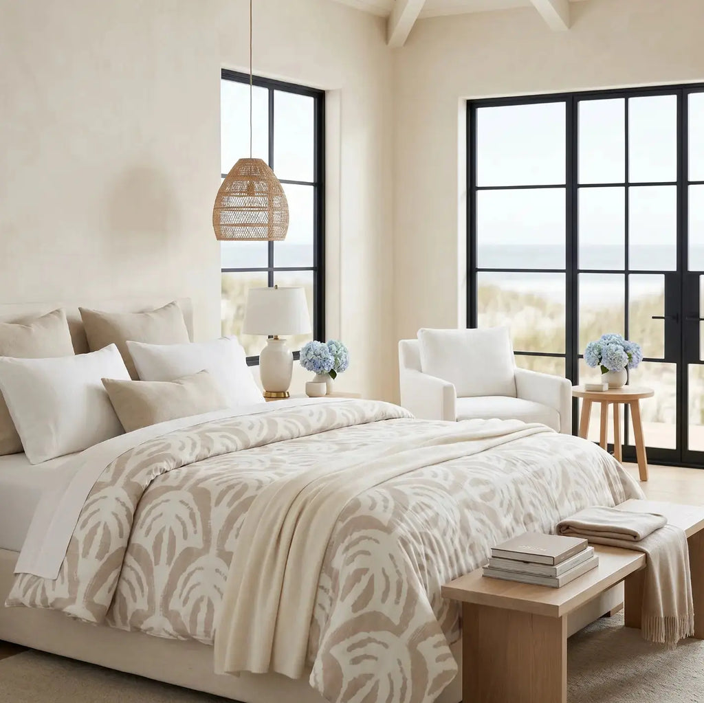 Tan pattern comforter creating soft, neutral bedding in a modern farmhouse bedroom