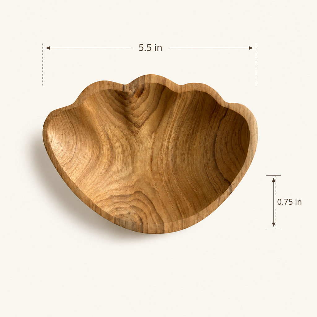 Luxury teak shell catchall for beach house styling and everyday storage.