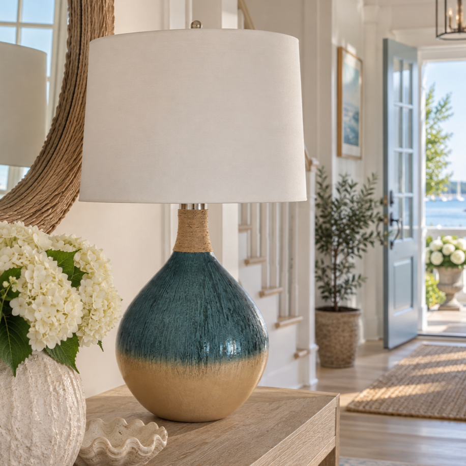 Teal ceramic coastal table lamp with a textured blue-green finish and crisp white drum shade