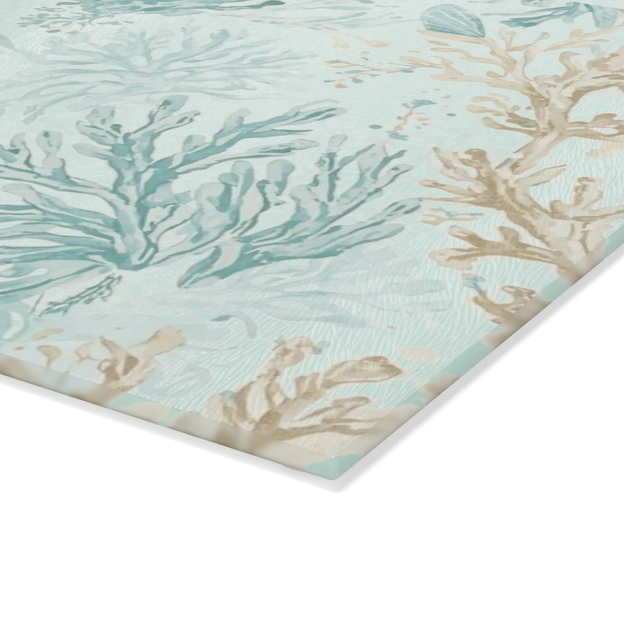 Coral Cove Cutting Board with aqua coral reef pattern on tempered glass with a beveled edge.