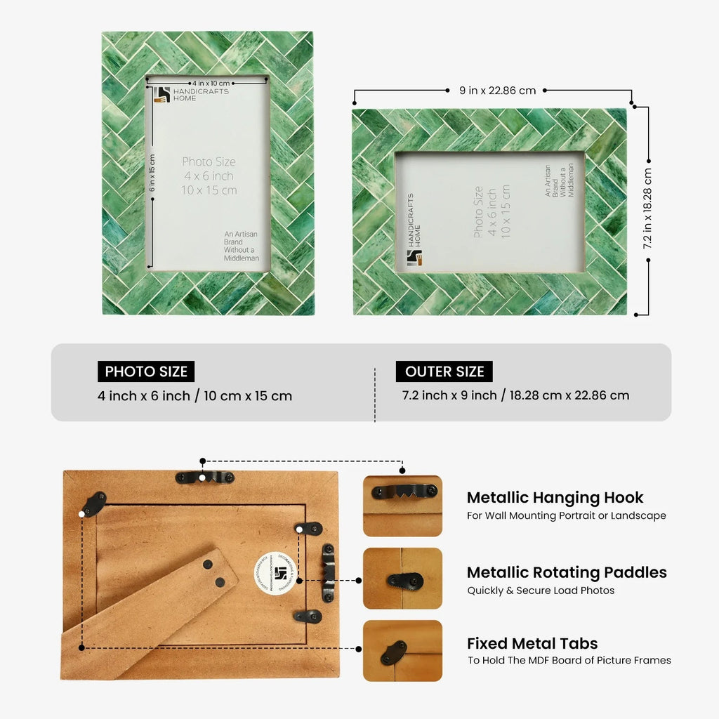 Dark green tropical leaf picture frame standing on a white shelf as part of beach house decor