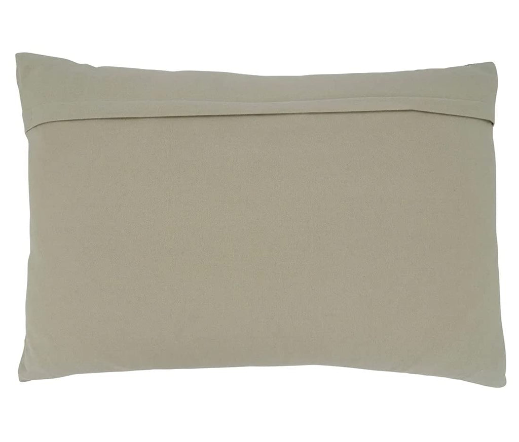 Textured woven color block lumbar pillow bringing modern boho coastal style to a seating area.