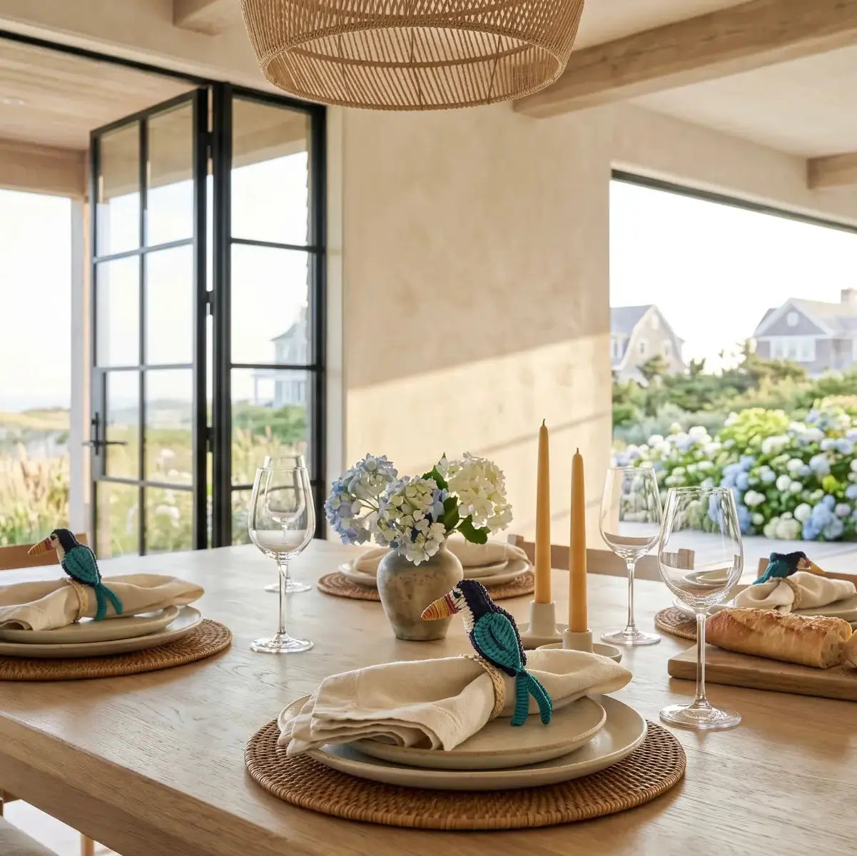 Handwoven Iraca palm toucan napkin ring adding a playful touch to beach house table decor