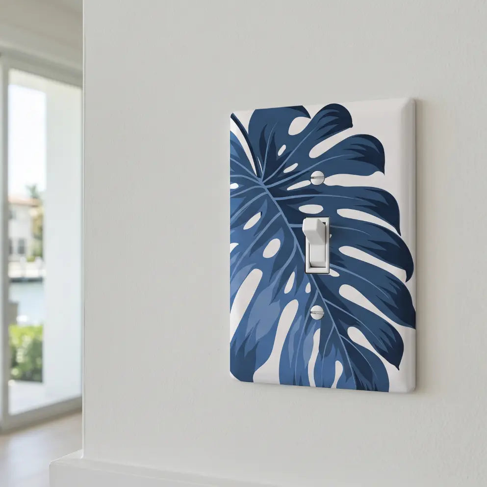 Modern coastal room with blue botanical switch plate accent