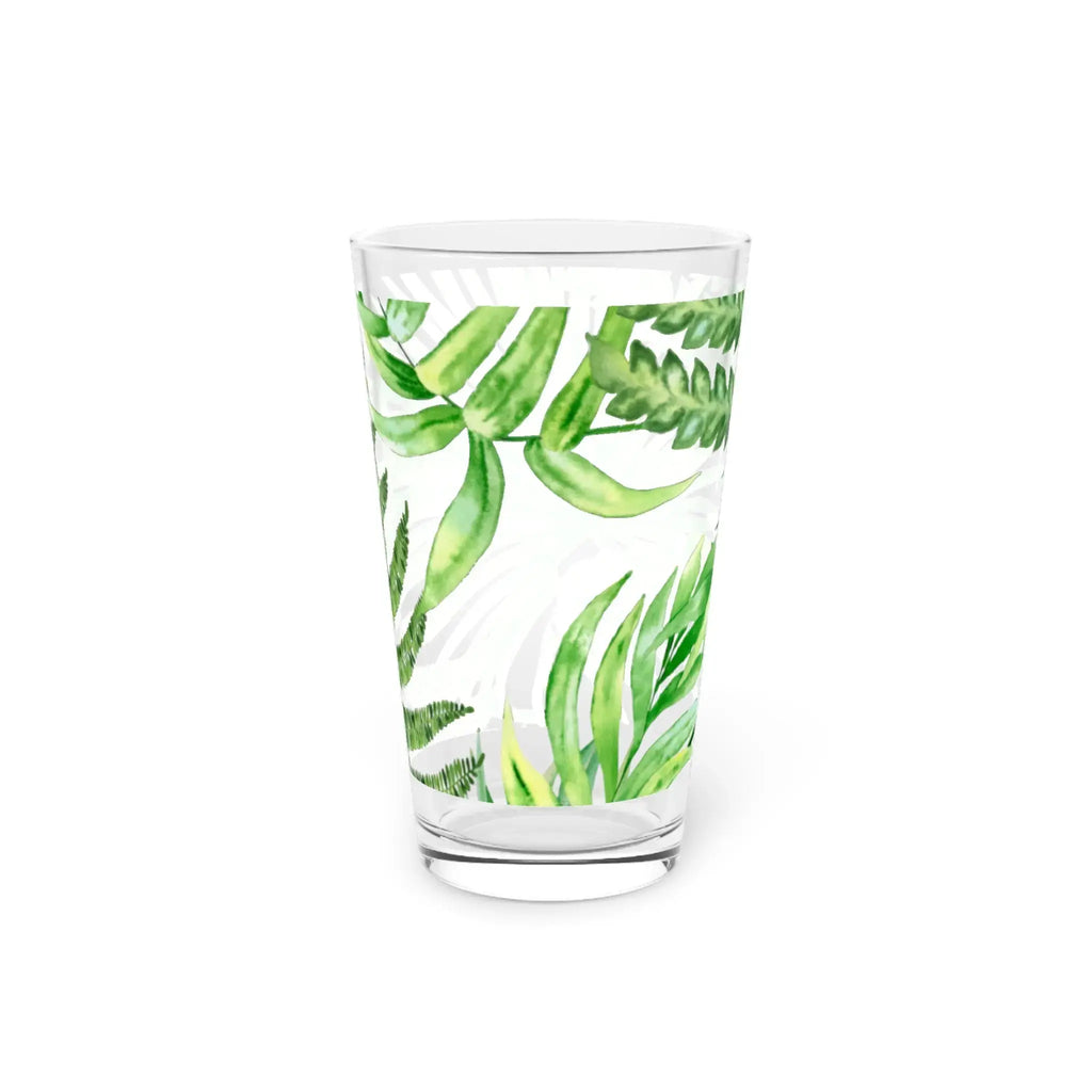 Set of four tropical drinking glasses with palm tree design for coastal barware