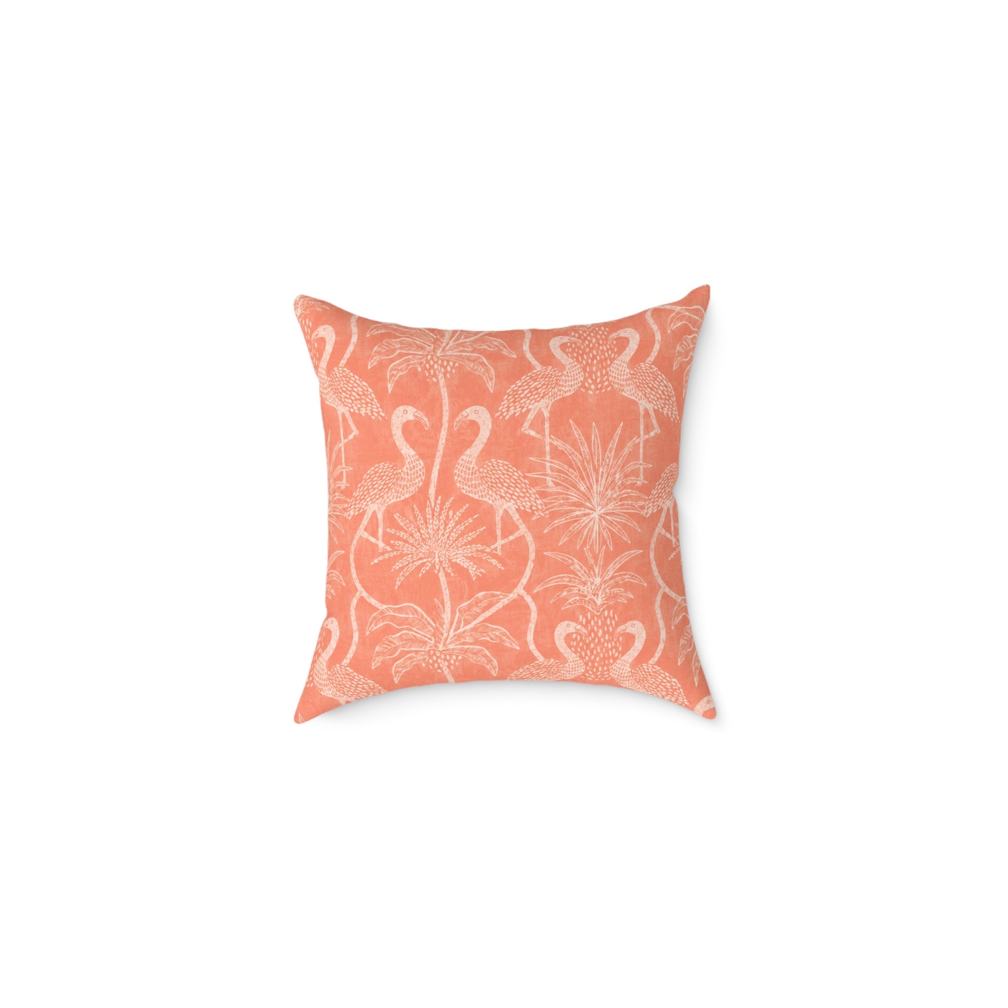 Tropical flamingo print cushion adding a playful coastal pop of color to a chair, sofa, or bed.
