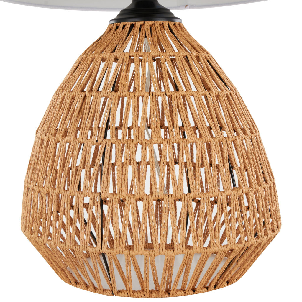 Neutral woven rattan lamp for modern coastal home interiors.