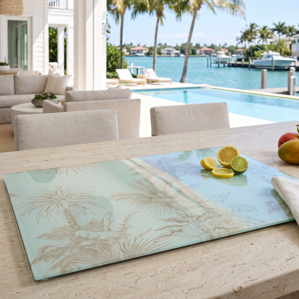 Tropical palm‑print cutting board that doubles as a decorative serving board for coastal entertaining.