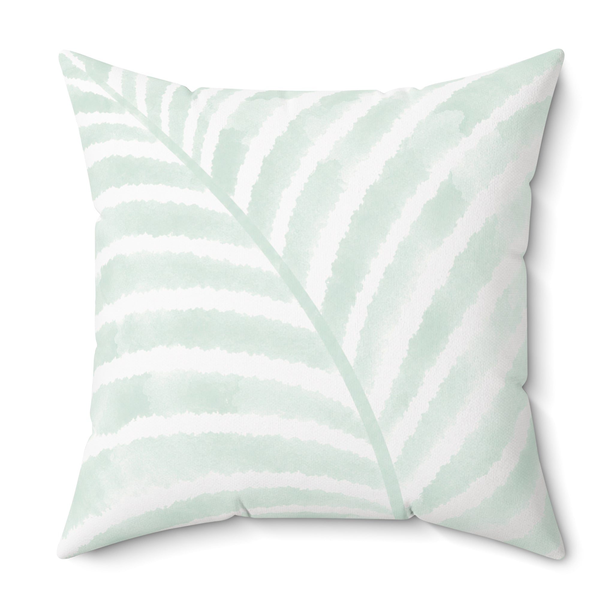 Coastal living room pillow featuring a mint green palm frond motif.