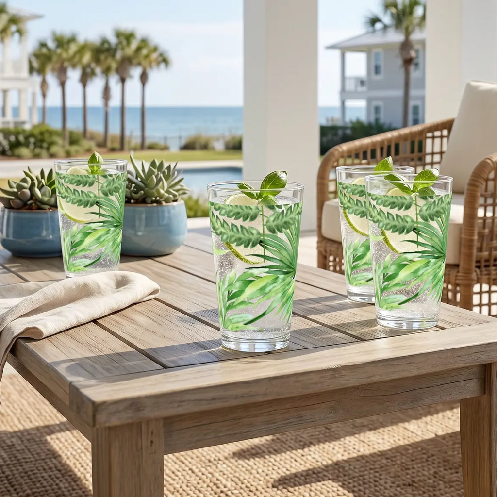 Tropical palm tree drinking glass set, clear glasses for beach-themed cocktails.