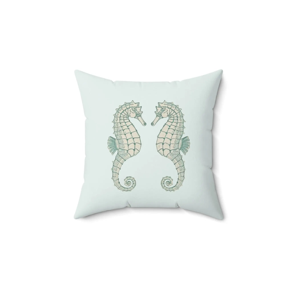 Twin Seahorse Throw Pillow featuring two illustrated seahorses facing each other on pale aqua background