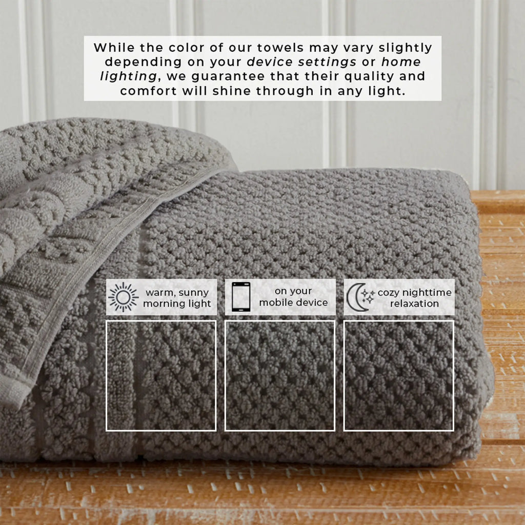 Giuliana Collection bath towel set by Great Bay Home, 100% cotton checkered jacquard in gray, stacked on wood