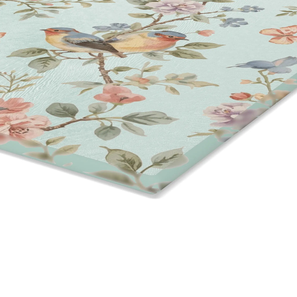 Meadow Glass Cutting Board with Floral Songbird design; watercolor birds among blossoms on pale blue.