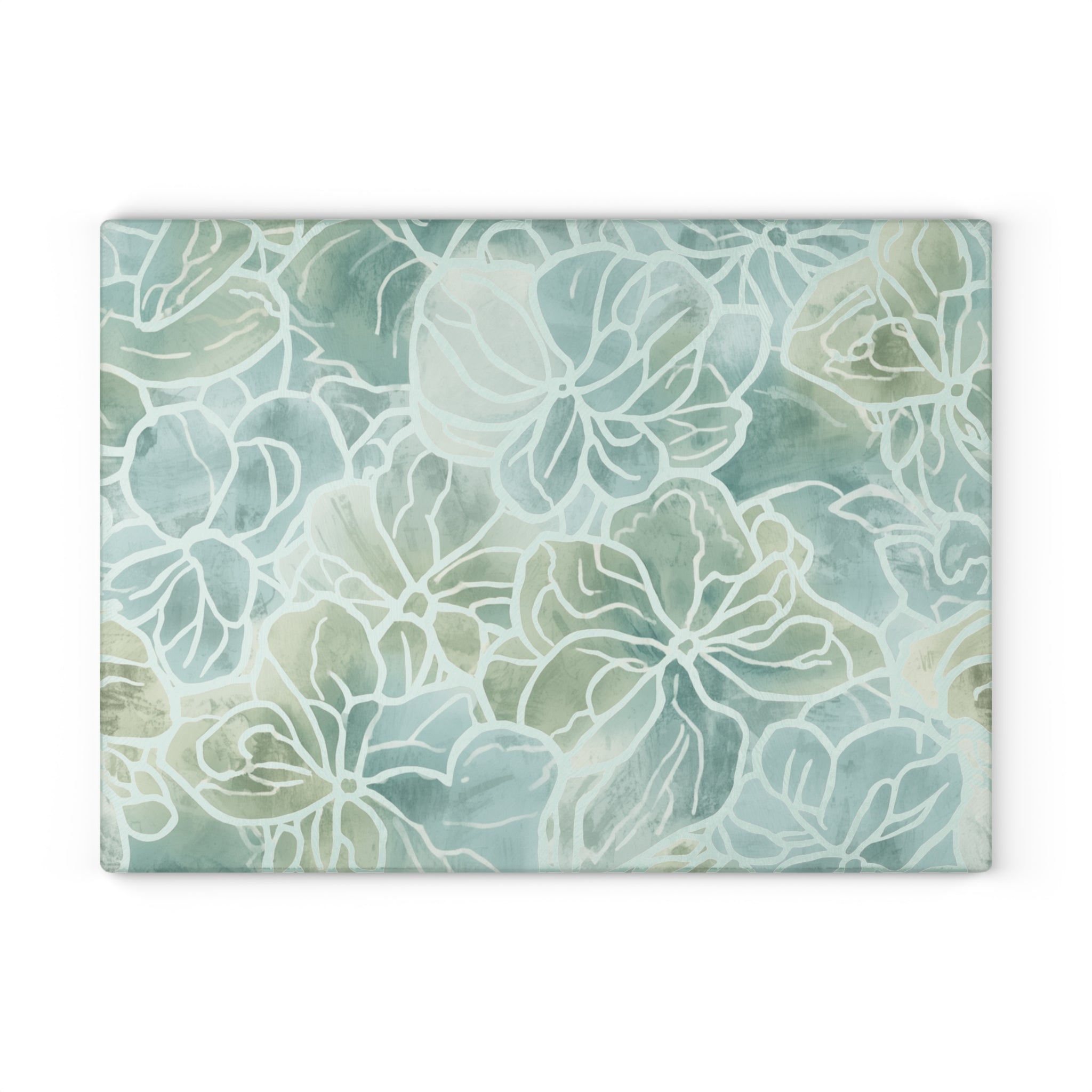Blue‑green flower pattern cutting board with white linework for a fresh modern coastal kitchen look.