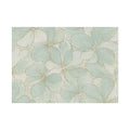 Muted aqua and ivory petal design rug adding a gentle, spa‑like feel to a coastal space.
