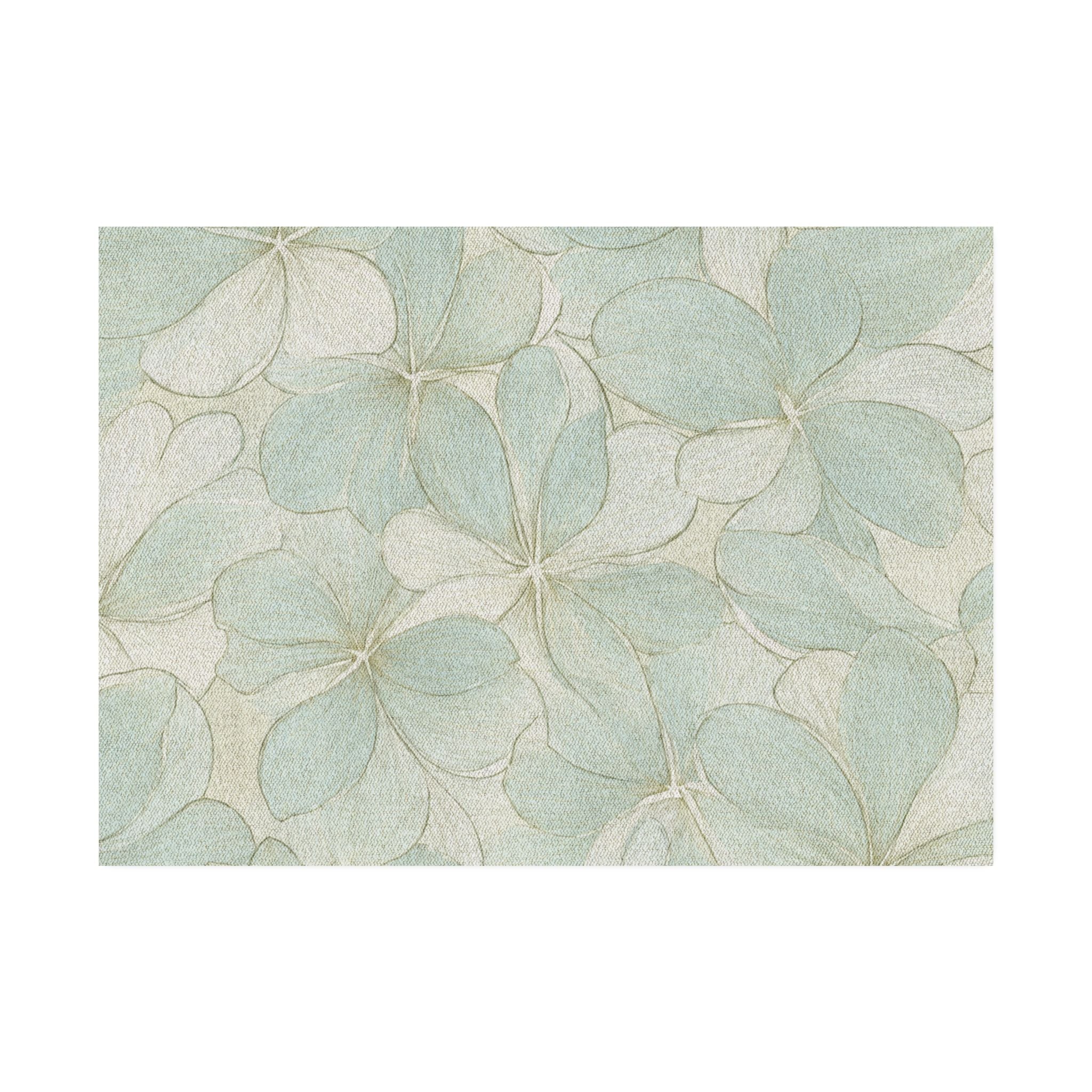 Muted aqua and ivory petal design rug adding a gentle, spa‑like feel to a coastal space.