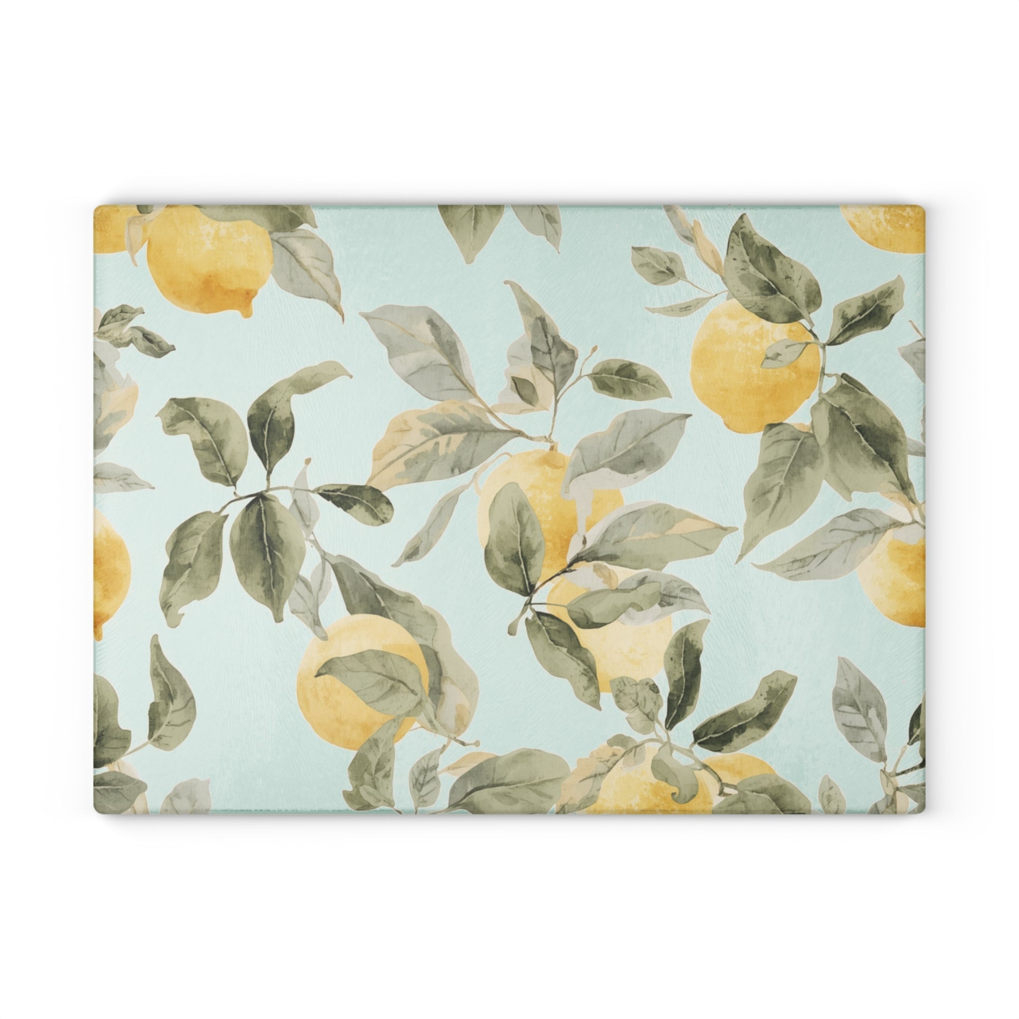 Decorative lemon glass cutting board displayed on a kitchen counter as cheerful summer decor.