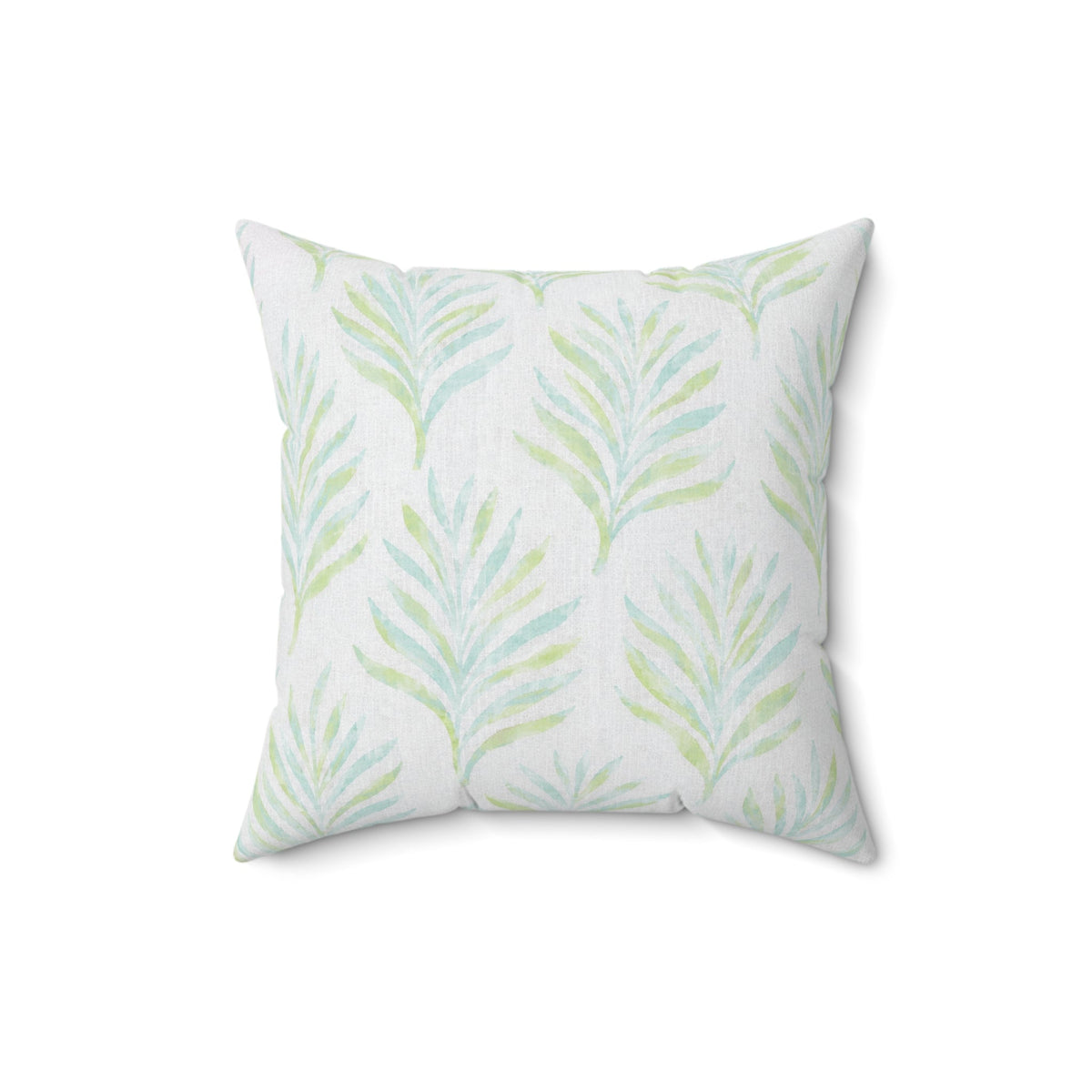 Watercolor palm leaf pillow in blue and green for a coastal home