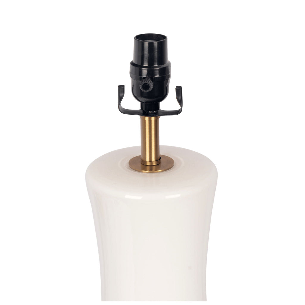 Decorative white and gold table lamp for elevated home styling.