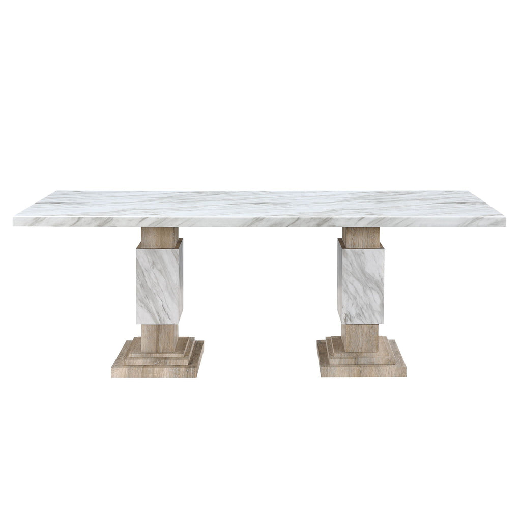 White stone-look dining table with a rectangular top and two substantial pedestal supports