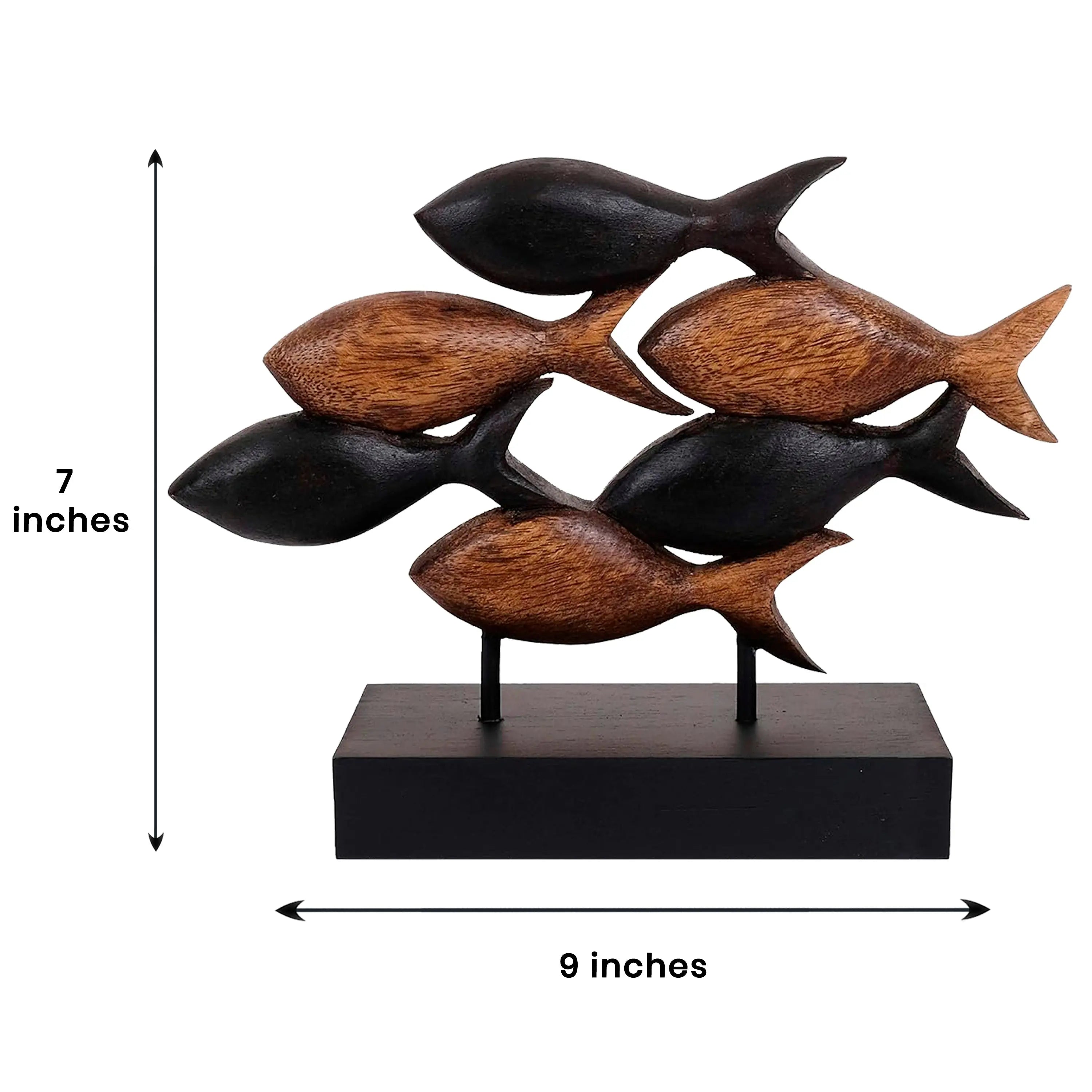 Carved wood fish sculpture adding a natural coastal accent to a living room