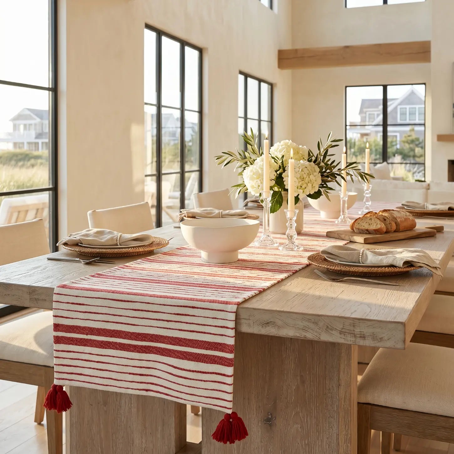 Woven red and white stripe table runner creating a casual coastal tablescape.