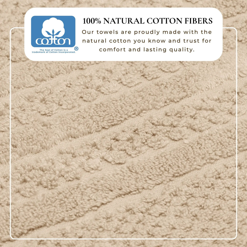 Beige bath towel; 100% cotton with plush terry texture.